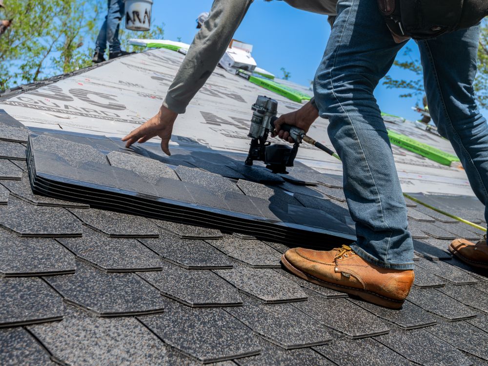 Roofing — crew installing a roof
